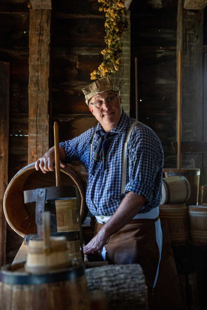 man working on a barrel