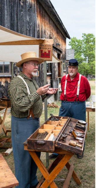 2 men at an outdoor market